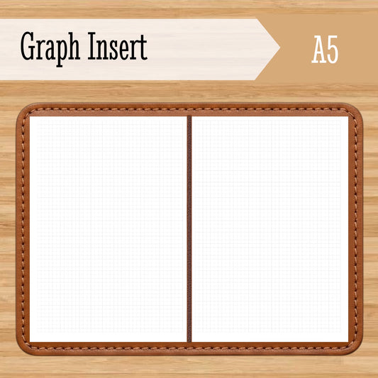 Open A5 Graph Travelers Notebook Insert – Fountain Pen Friendly, Hand-Stitched Kraft Cover showing grid paper with fine graph lines and stitched brown leather edges on wooden background.