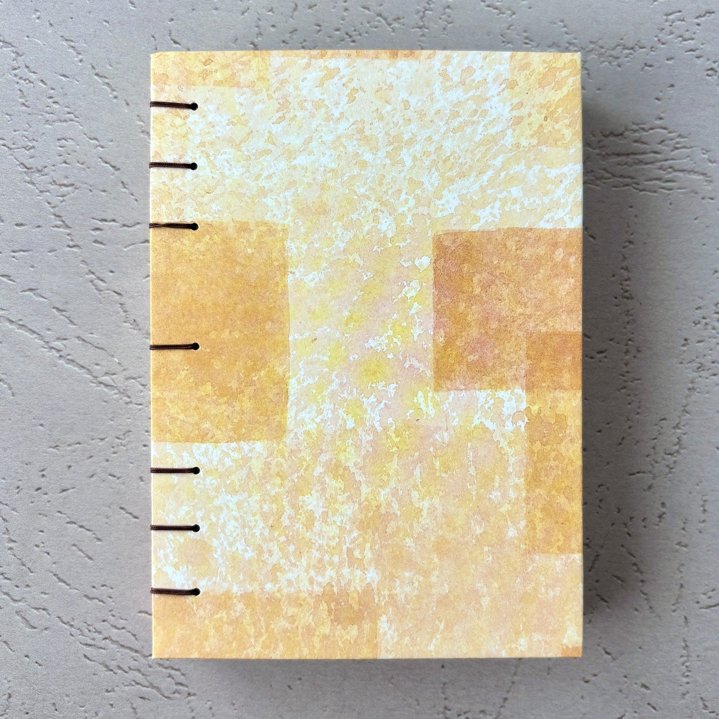 Blocked Orange - A6 - Lined - Coptic Bound - Fountain Pen Notebook - Handmade Journal with abstract orange handmade cover and visible coptic stitching