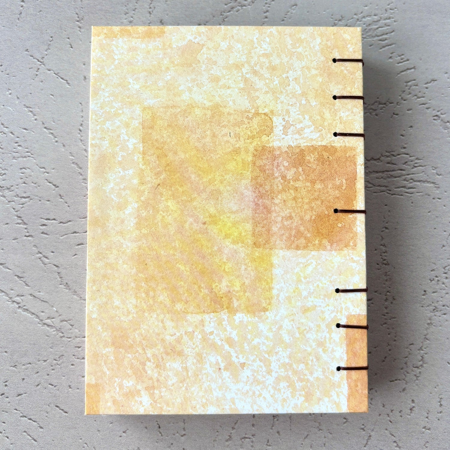 Blocked Orange - A6 - Lined - Coptic Bound - Fountain Pen Notebook - Handmade Journal with abstract orange and cream cover and exposed coptic binding