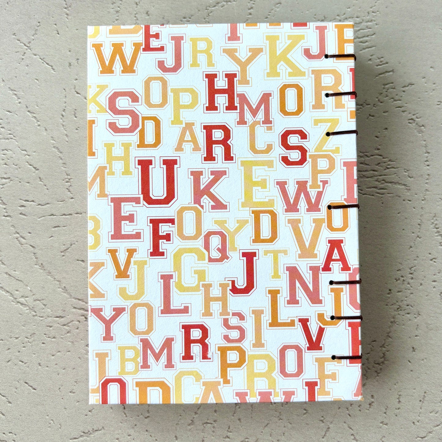 University Monogram - A6 - Lined - Coptic Bound - Fountain Pen Notebook - Handmade Journal with colorful letter cover and exposed stitched binding